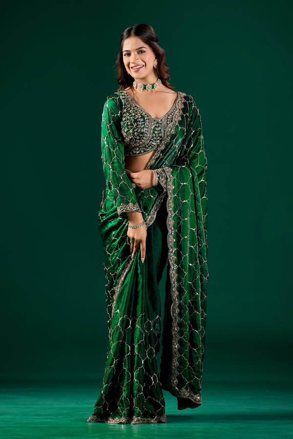 Green silk saree with rose gold cutdana work, luxurious Barsana design by Kanyaari, featuring intricate embroidery and elegant drape.