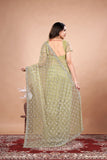Cross Stylish Green Net saree with Cutdana Work