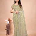 Cross Stylish Green Net saree with Cutdana Work