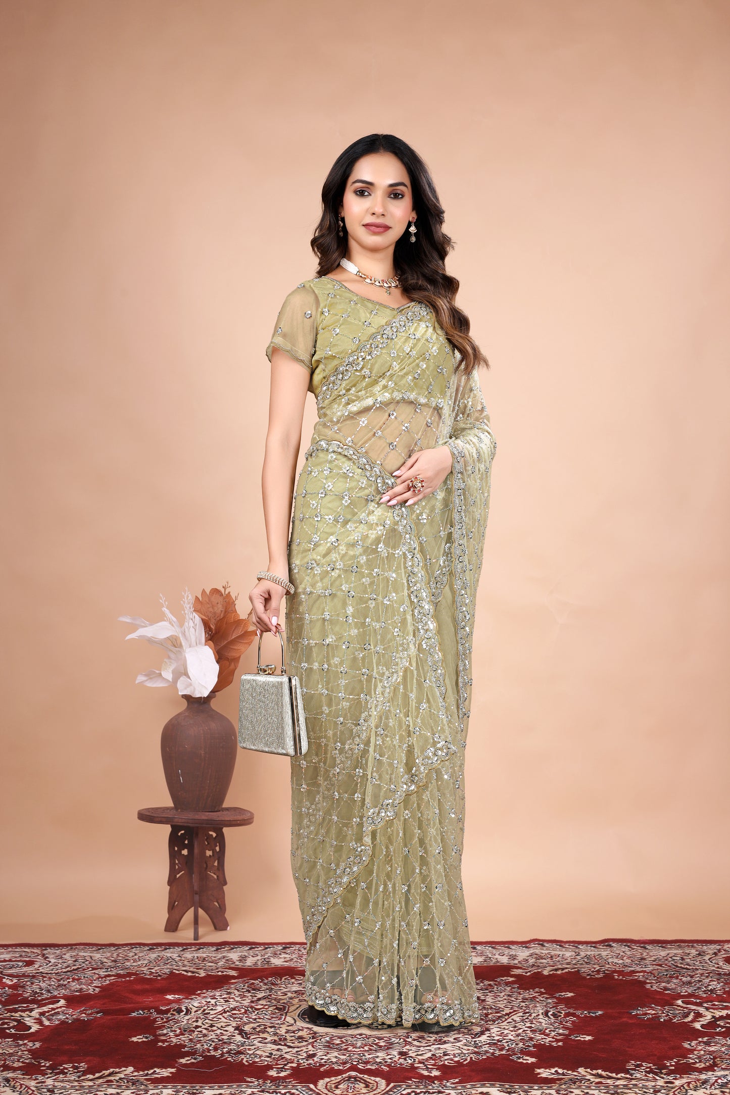 Cross Stylish Green Net saree with Cutdana Work