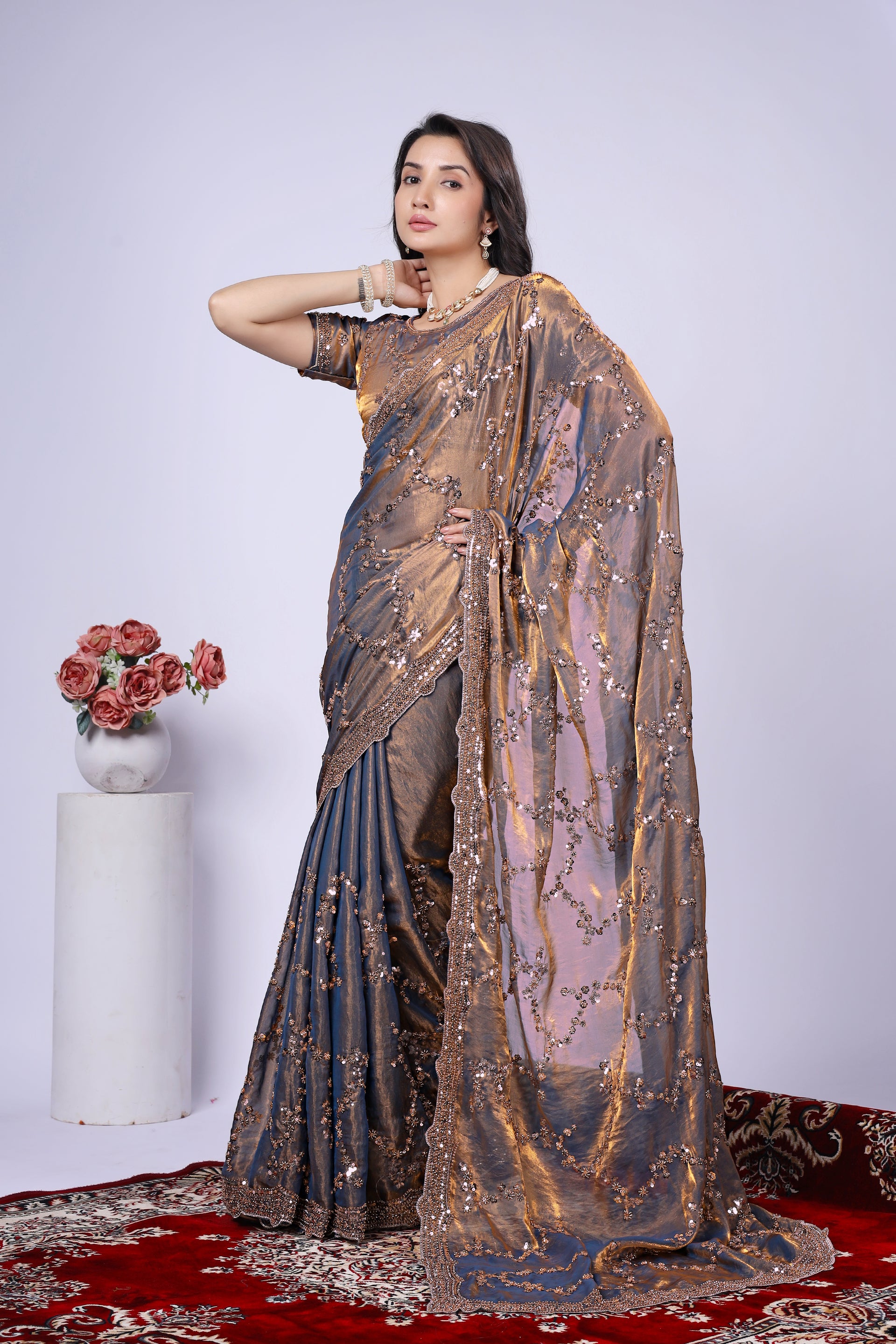 Nakhrali premium silk saree by Kanyaari featuring elegant rose gold cutdana work and intricate detailing on the fabric.