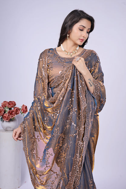 Kanyaari Nakhrali premium silk saree with intricate rose gold cutdana work, featuring elegant draping and detailed embroidery.