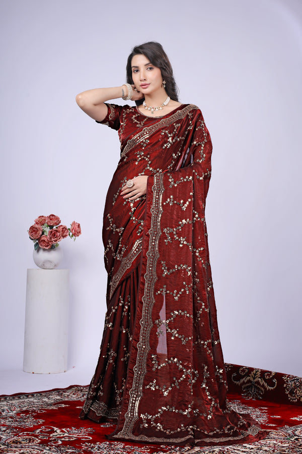 Kanyaari premium maroon silk saree with rose gold cutdana work, featuring intricate embroidery and elegant drape.