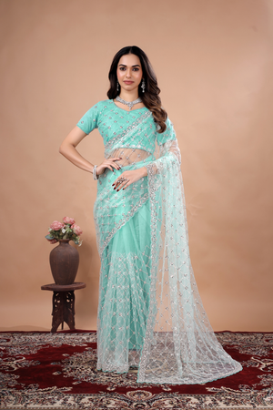 Blue Kanyaari party wear saree with intricate cutdana work, featuring a stylish drape and elegant design perfect for celebrations.