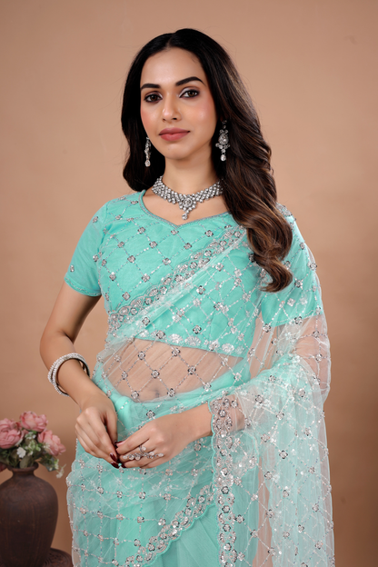 Blue Kanyaari party wear saree with intricate Cutdana work, showcasing elegant drape and detailed embellishments.