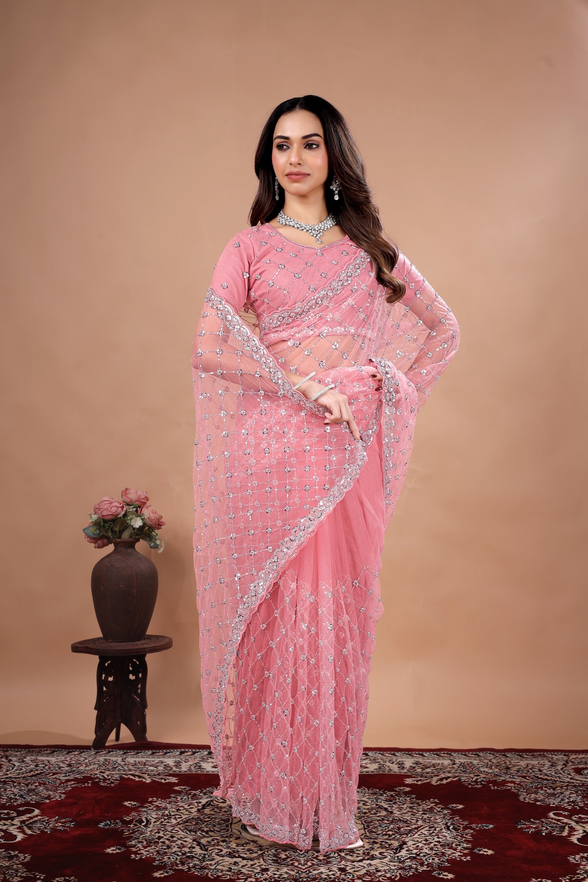 Kanyaari cross stylish party wear saree with intricate cutdana work, featuring vibrant fabric and elegant draping for special occasions.