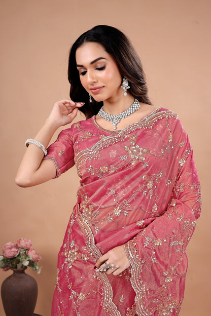 Kanyaari premium silk saree with heavy floral cutdana work, featuring intricate embroidery and elegant drape in rich silk fabric.