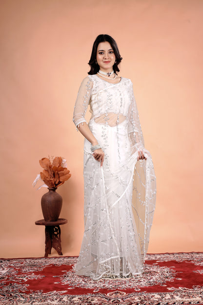 Elegant Tamanaa saree by Kanyaari featuring intricate cutdana and sequence work, showcasing vibrant fabric and detailed craftsmanship.