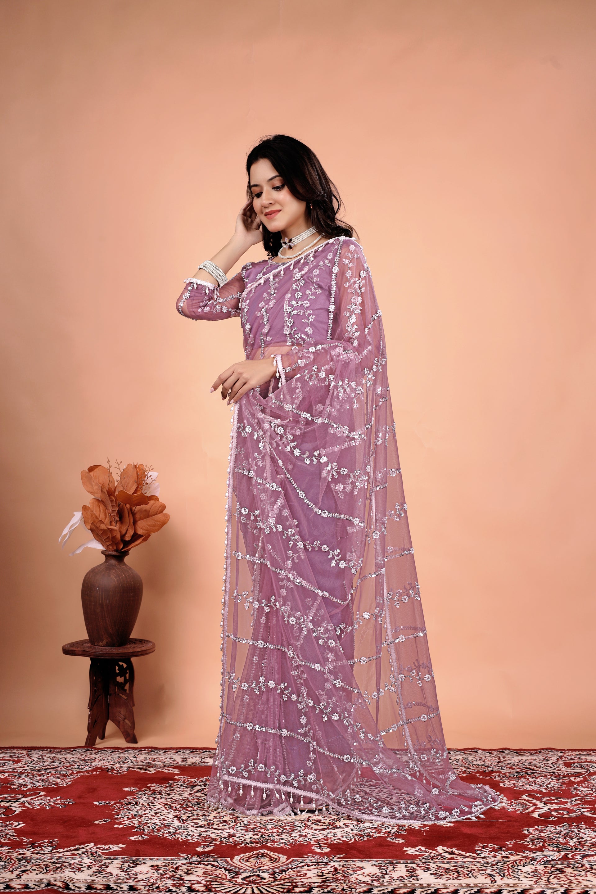 Kanyaari Tamanaa stylish saree with intricate cutdana and sequence work, featuring elegant traditional embroidery and vibrant fabric.