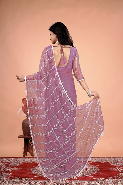 Kanyaari Tamanaa stylish saree featuring intricate cutdana and sequins work, displayed with draped fabric and detailed embellishments.