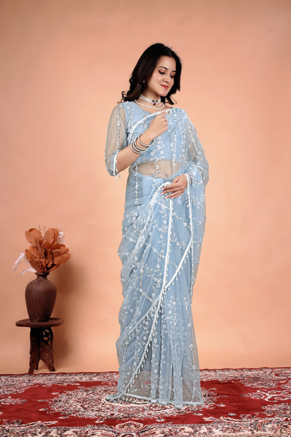 Kanyaari Tamanaa stylish saree with intricate cutdana and sequins work, featuring elegant draping and detailed embellishments.