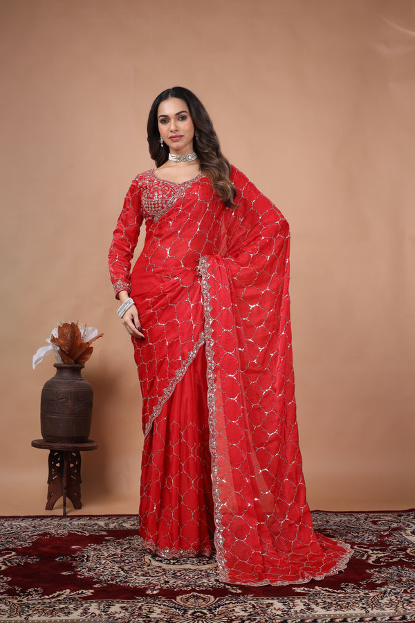 Red silk saree with rose gold cutdana work from Kanyaari featuring intricate embroidery and traditional design.