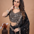 Kanyaari full heavy black saree with intricate cutdana work, showcasing detailed embroidery and traditional Indian design.