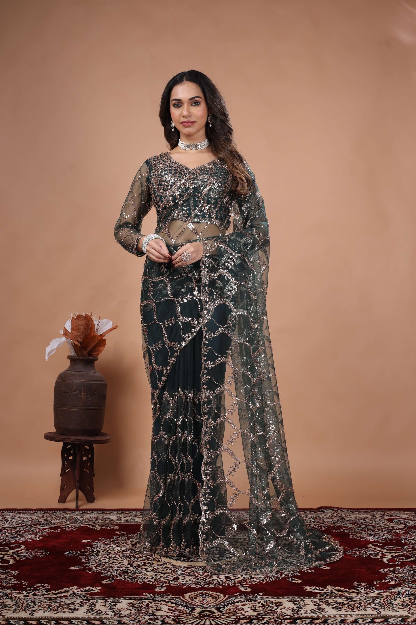 Green Net Saree Featuring Heavy Cutdana Work Border (Karina)