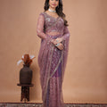 Purple Kanyaari saree with heavy cutdana embroidery and net fabric, showcasing intricate design and traditional craftsmanship.