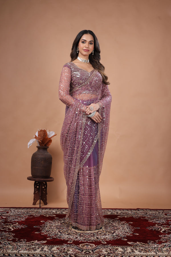 Purple Kanyaari saree with heavy cutdana embroidery and net fabric, showcasing intricate design and traditional craftsmanship.