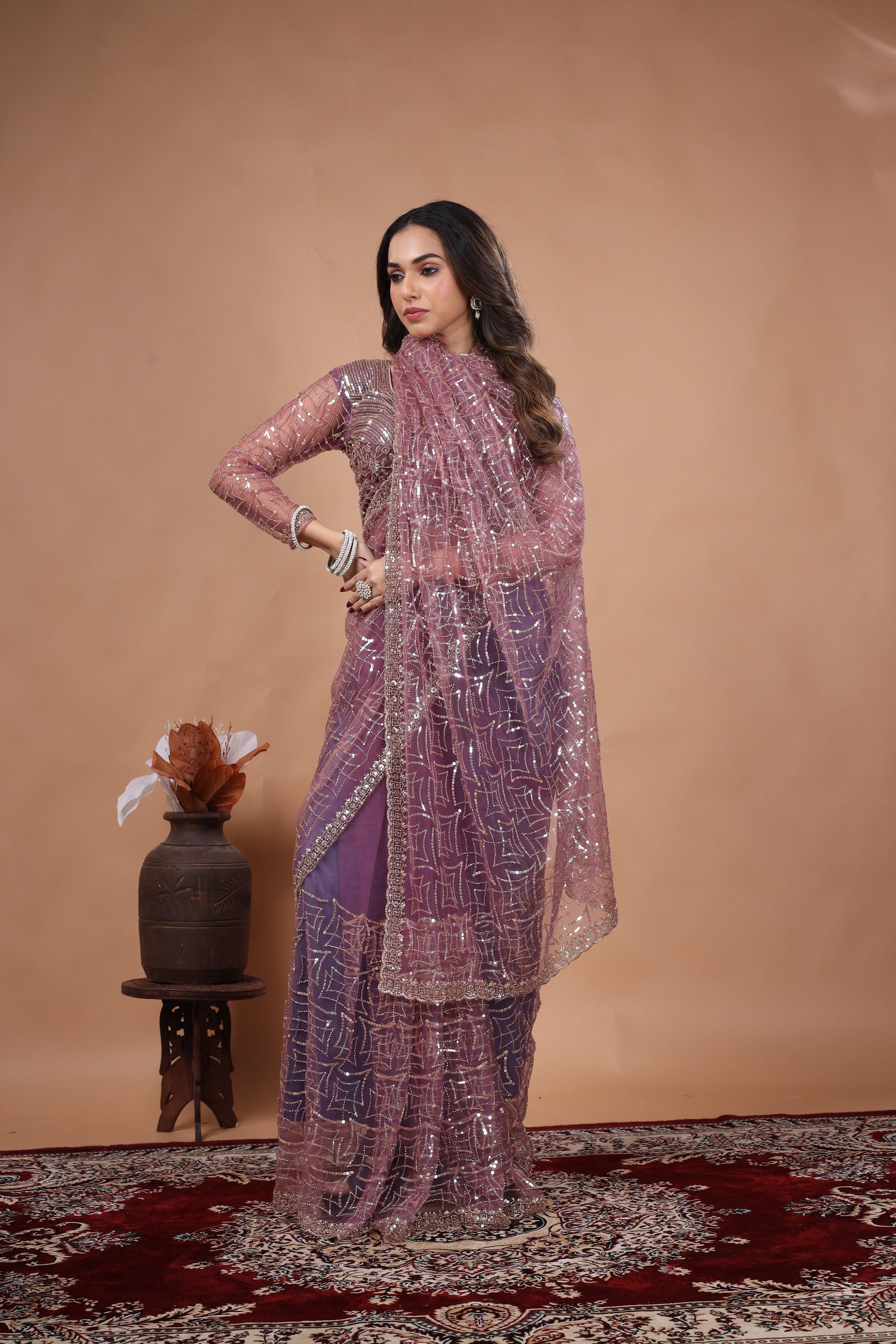Purple Kanyaari Saree with heavy cutdana embroidery and net fabric, featuring intricate designs and elegant draping.