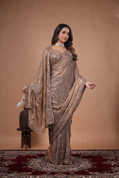 Elegant silk saree with rose gold cutdana work, showcasing intricate gold embroidery and luxurious fabric by Kanyaari.