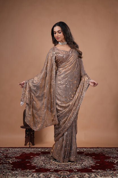Luxury silk saree with rose gold cutdana work, gold accents, and intricate detailing from Kanyaari's Rashmika collection.