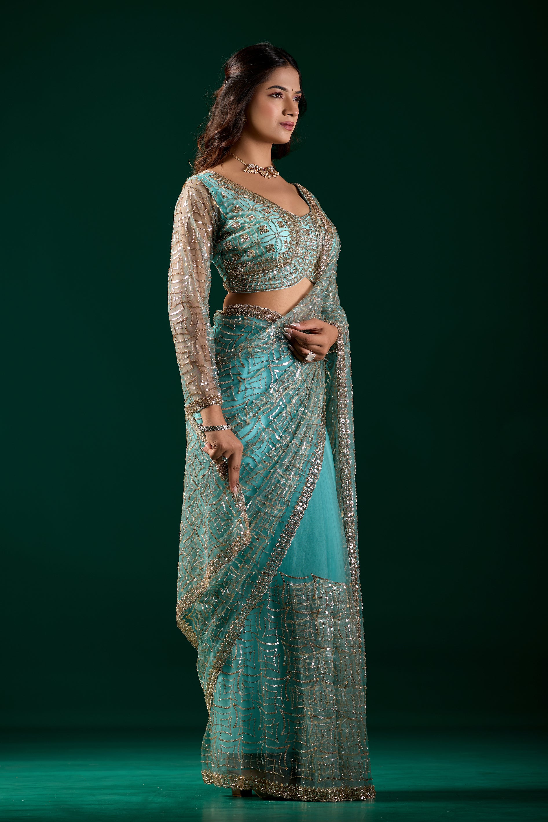 Kanyaari Styalish net heavy cutdana embroidered blue saree with intricate embroidery and elegant drape, modeled by Katrina.