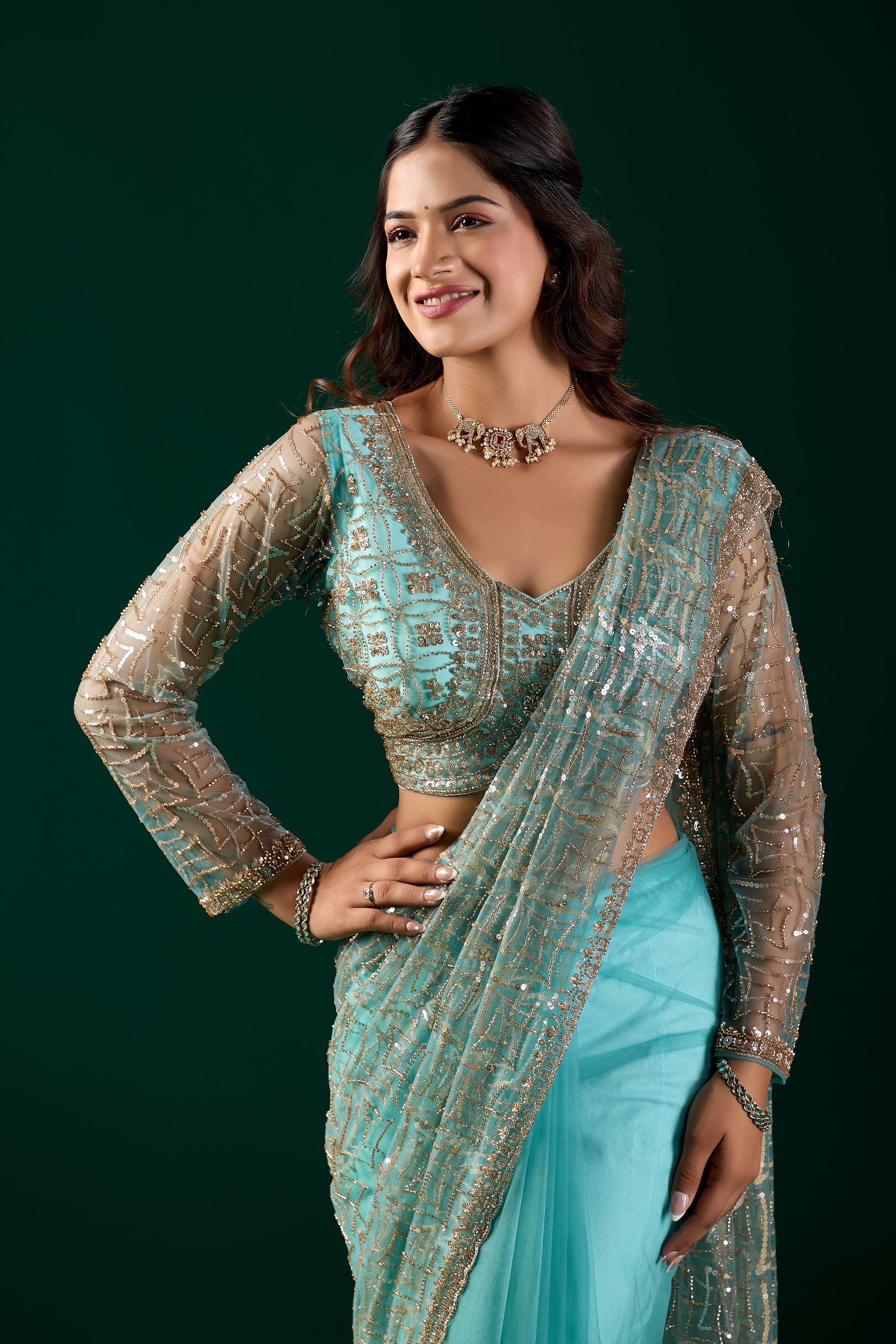 Blue saree by Kanyaari featuring heavy cutdana embroidery and net fabric, worn by Katrina for a stylish and elegant look.