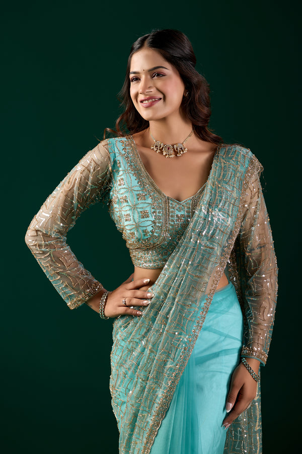Blue saree by Kanyaari featuring heavy cutdana embroidery and net fabric, worn by Katrina for a stylish and elegant look.