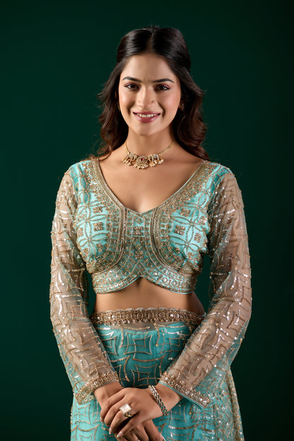 Blue embroidered saree with heavy cutdana work by Kanyaari, featuring intricate net fabric and elegant design, styled by Katrina.