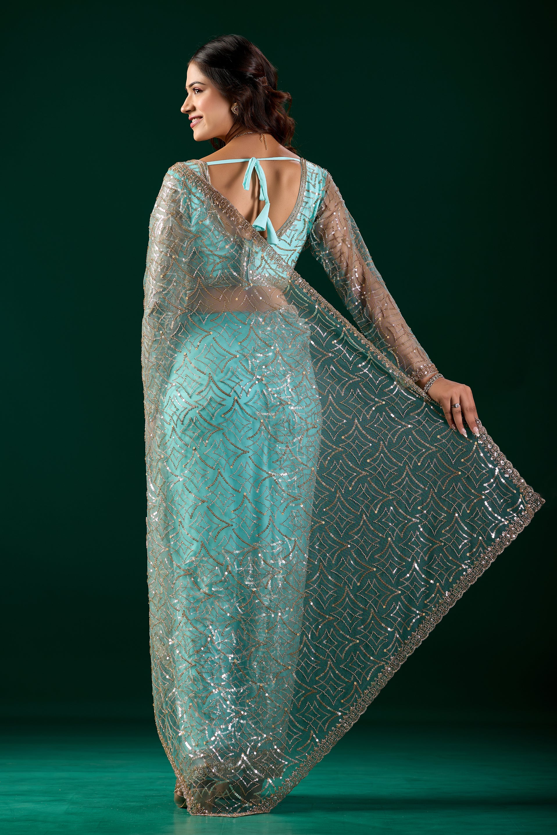 Blue Kanyaari saree with heavy cutdana embroidery and net fabric, featuring intricate designs and traditional style.
