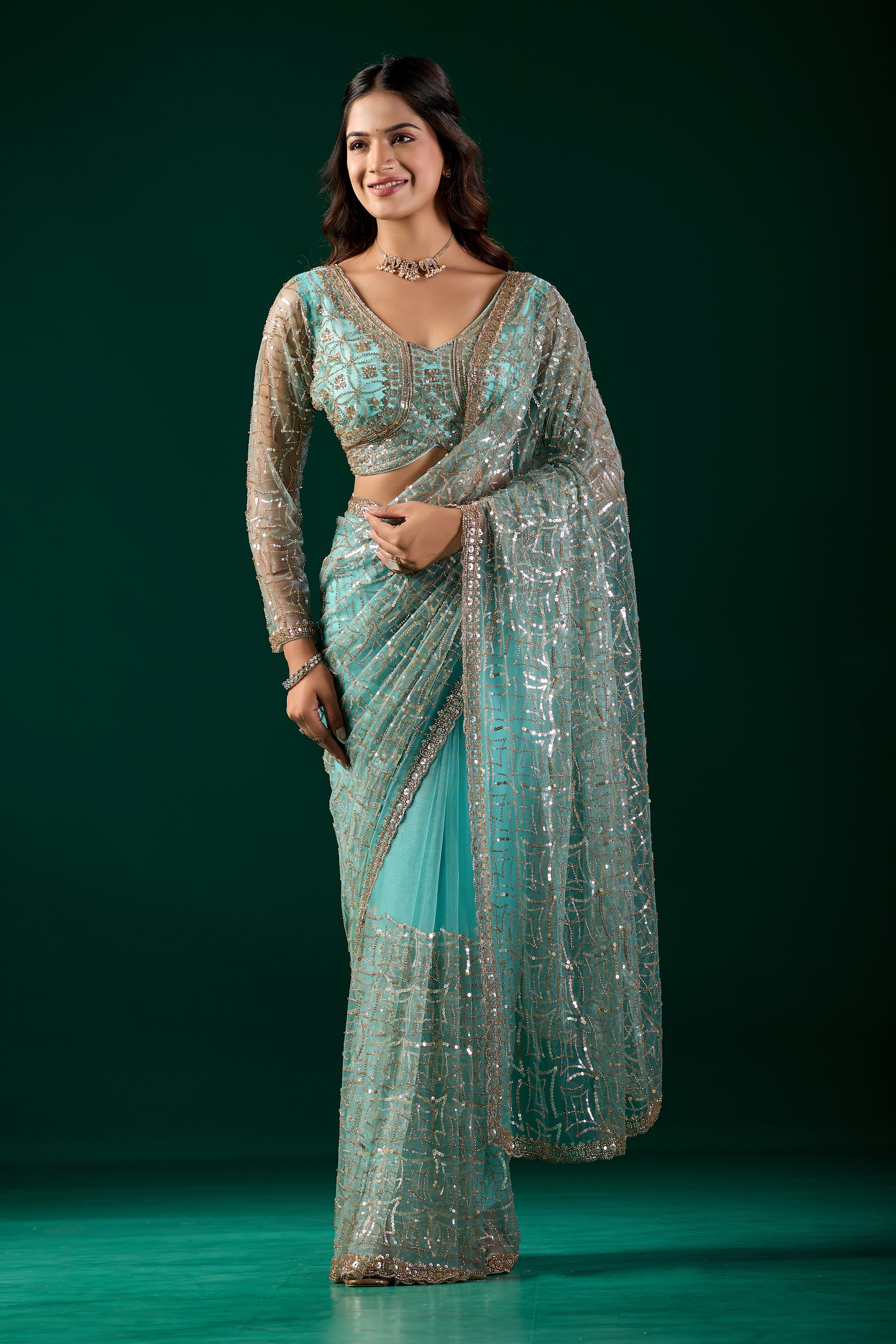 Blue Kanyaari saree with heavy cutdana embroidery and net fabric, featuring intricate design and elegant drape.