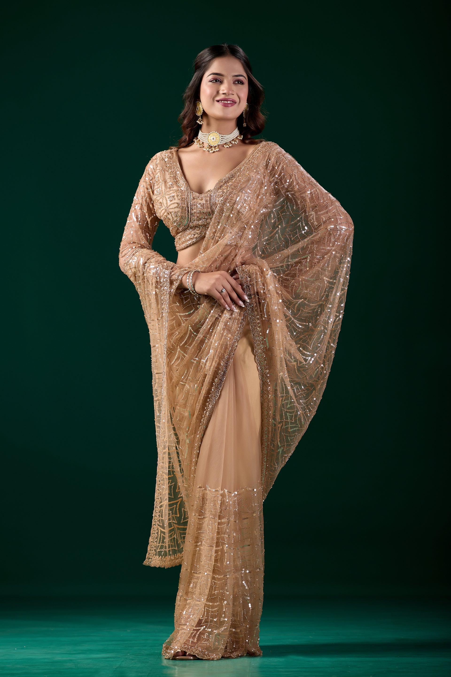 Yellow embroidered saree with heavy cutdana work by Kanyaari, featuring intricate net fabric and vibrant design, worn by Katrina.