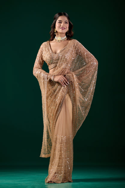 Yellow embroidered saree with heavy cutdana work by Kanyaari, featuring intricate net fabric and vibrant design, worn by Katrina.