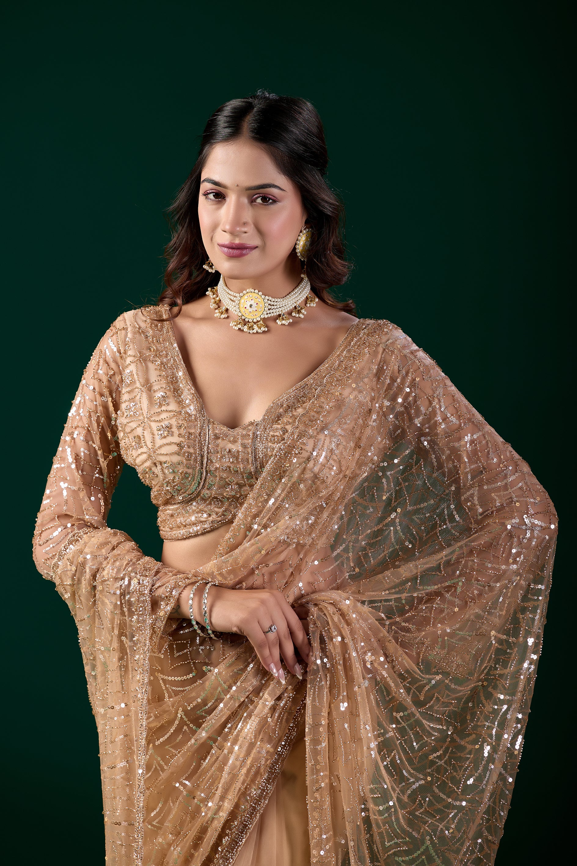 Yellow saree by Kanyaari featuring heavy cutdana embroidery and net fabric, modeled by Katrina in a vibrant, elegant look.