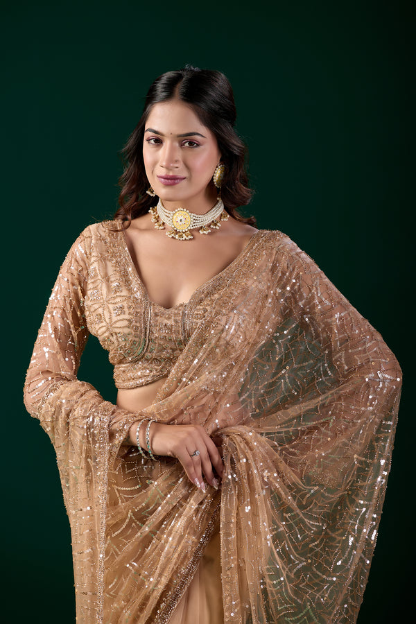 Yellow saree by Kanyaari featuring heavy cutdana embroidery and net fabric, modeled by Katrina in a vibrant, elegant look.