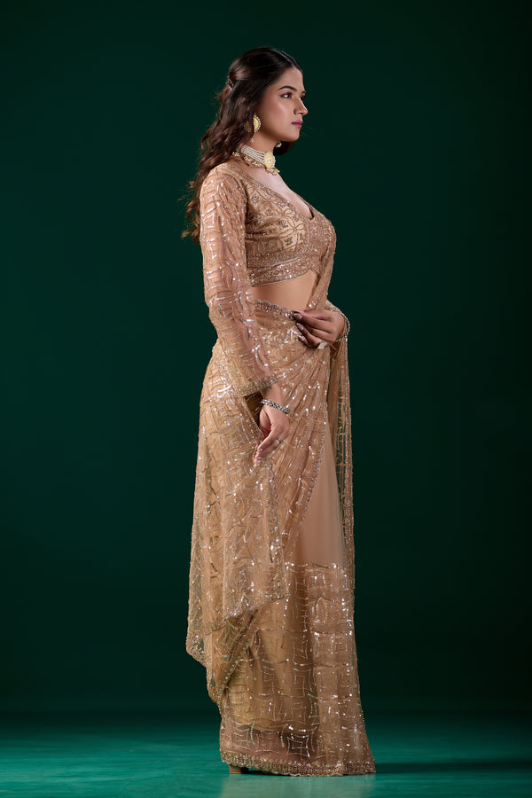 Yellow saree with heavy cutdana embroidery and net fabric by Kanyaari, featuring intricate embroidery and vibrant color.