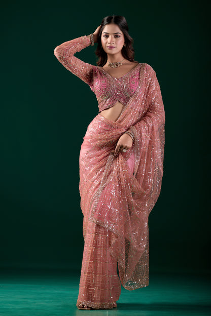 Pink embroidered saree by Kanyaari featuring heavy cutdana work and net fabric, worn by Katrina for elegant traditional style.