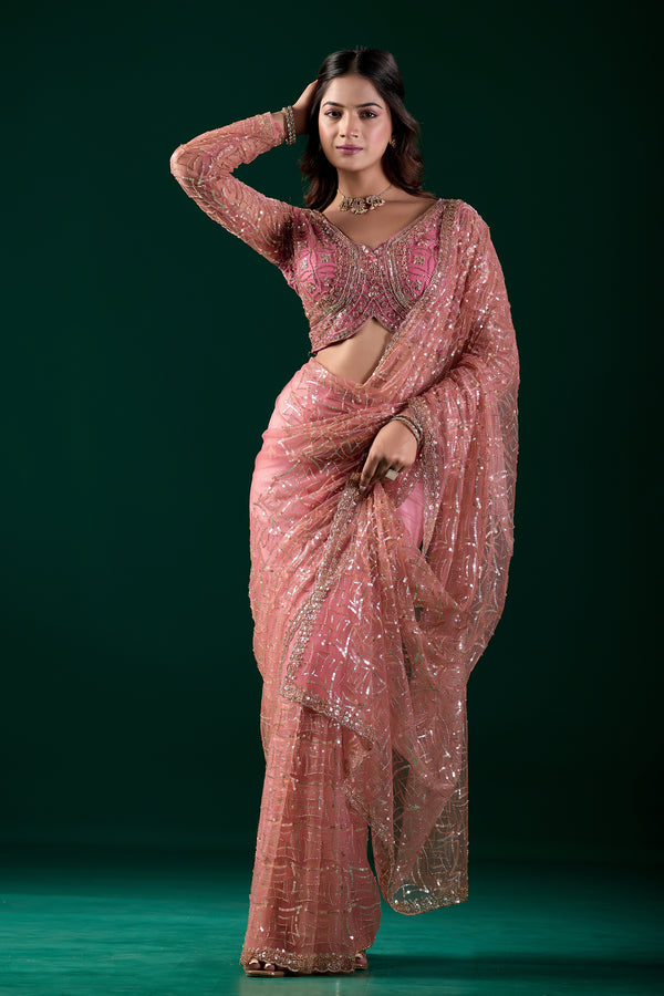Pink embroidered saree by Kanyaari featuring heavy cutdana work and net fabric, worn by Katrina for elegant traditional style.