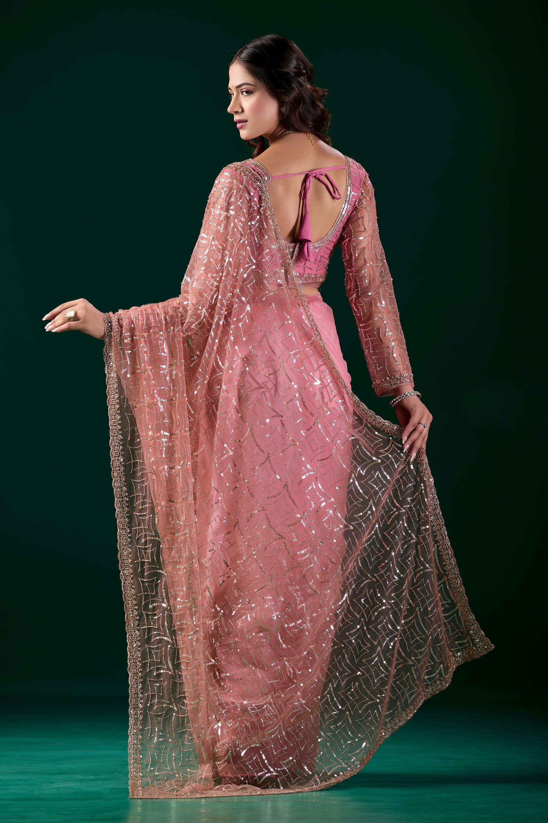 Kanyaari Styalish net pink saree with heavy cutdana embroidery and intricate design, worn by model for elegant traditional look.