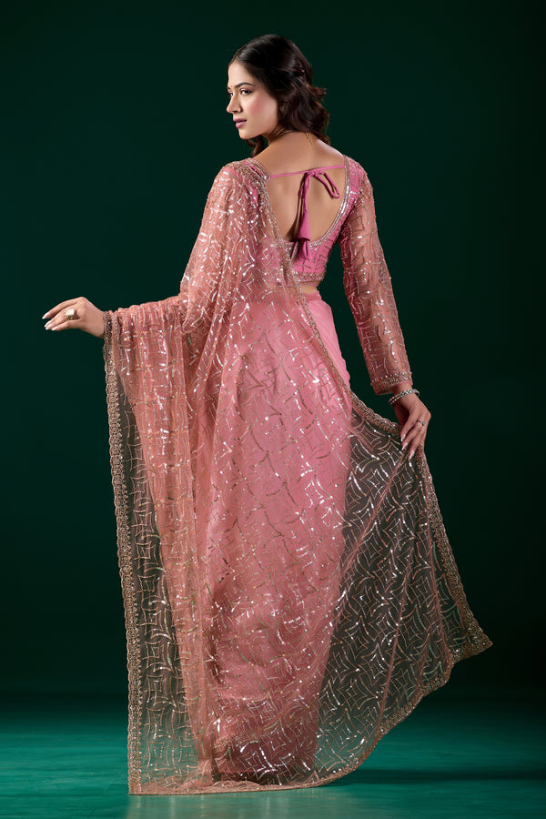 Kanyaari Styalish net pink saree with heavy cutdana embroidery and intricate design, worn by model for elegant traditional look.