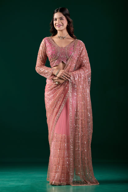 Kanyaari Styalish net pink saree with heavy cutdana embroidery, showcasing intricate design and elegant drape.