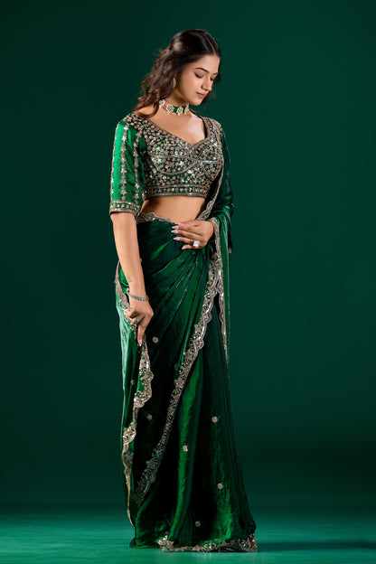 Green saree with cutdana work by Kanyaari, featuring intricate embroidery and elegant drape, shown in NoraGreen_3.jpg.