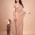 Cross Stylish Orange Net saree with Cutdana Work
