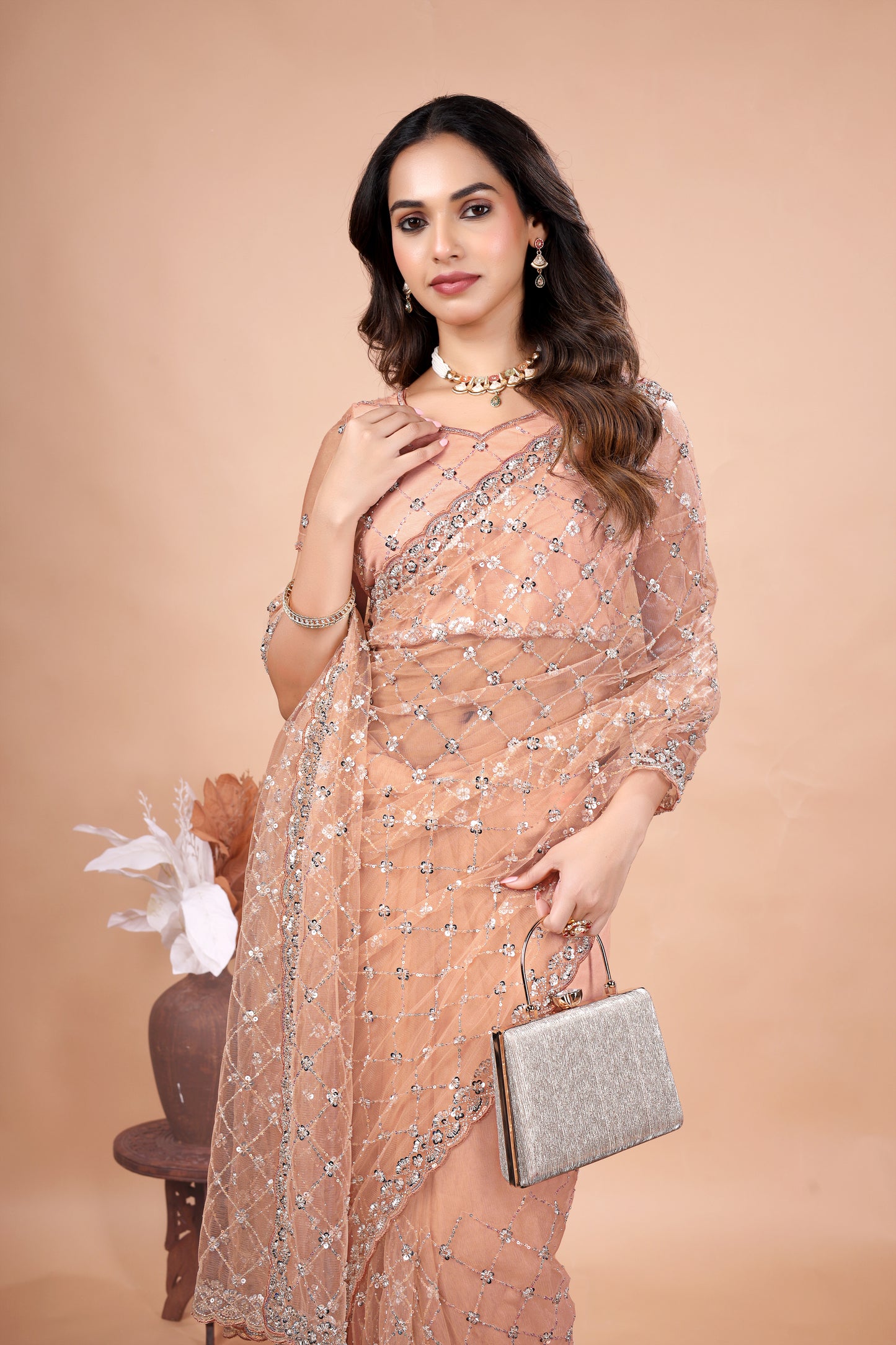 Cross Stylish Orange Net saree with Cutdana Work