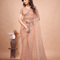 Cross Stylish Orange Net saree with Cutdana Work