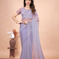 Cross Stylish Green Net saree with Cutdana Work